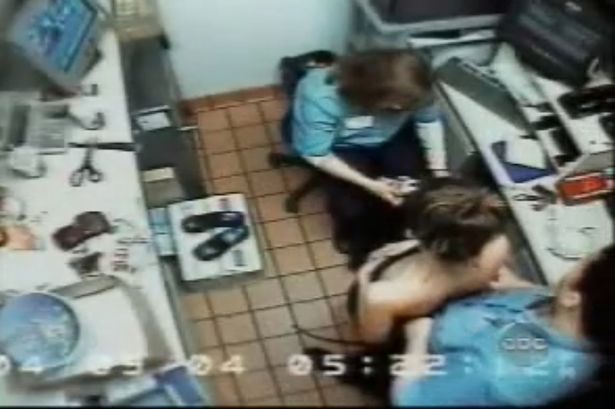 CCTV of Louise Ogborn being strip searched-1779564.png